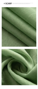 Detailed macro view of light green linen scarf fabric texture and soft woven wrinkles