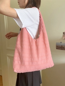 Pink pleated tote bag for women featuring a minimalist large capacity shoulder design