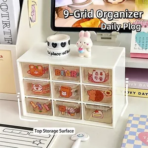 Creamy white 9-grid desktop organizer with transparent drawers and cute stickers