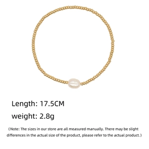 Detail showing 17.5cm length and 2.8g weight of baroque pearl gold bead bracelet
