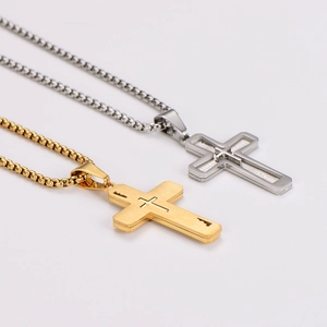Minimalist silver and gold cross necklaces with brushed finish on a neutral backdrop