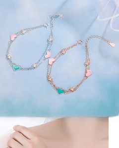 Detail view of S925 sterling silver double-layer bracelets with enamel hearts and crystals