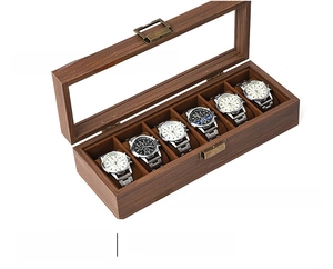 Close-up of a 6-slot leather watch box with transparent window and soft brown pillows