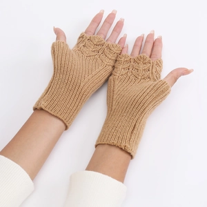 Detail of camel knit fingerless gloves with 3D flower pattern and ribbed cuffs