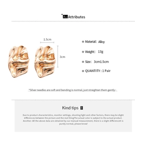 Detail view of gold irregular crinkle earrings with 1.5x3cm dimensions and alloy material