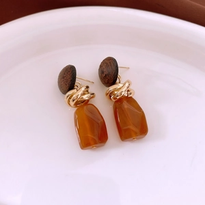Vintage geometric earrings with round wood beads and amber resin drops in gold finish