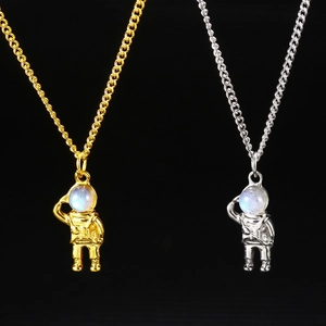 Hip hop astronaut pendant necklace in gold and silver steel with glowing moonstone