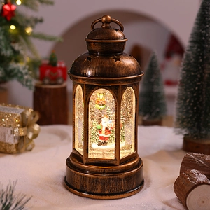 Detail of vintage bronze Christmas lantern with Santa Claus and sparkling gold glitter flakes