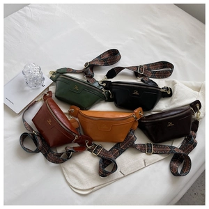Collection of oil wax leather waist bags in various colors with vintage jacquard straps