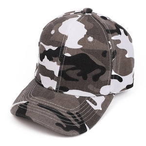 Detail view of a camouflage baseball cap featuring a six-panel crown and curved brim