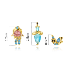 Detailed view of 18K gold earrings set with colorful zircons in various sizes