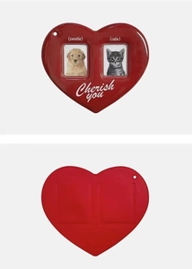 Detail of red heart-shaped dual photo frame keychain with Cherish You engraving