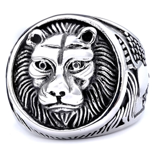 Antique silver lion head relief ring for men with detailed engraving on white background