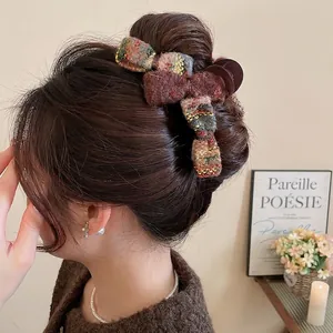 Elegant tweed flocking bow shark hair clip for women featuring retro autumn winter style