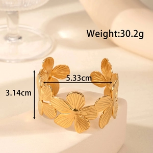 Golden flower hollow stainless steel cuff bracelet with 30.2g weight and adjustable opening