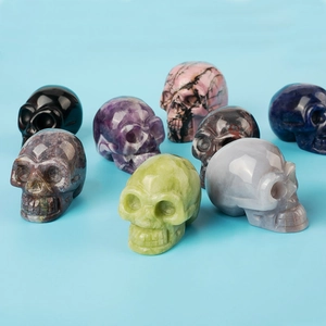 Handcrafted natural crystal skull figurines set in diverse colors for holistic decor
