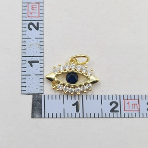 Size measurement of the gold evil eye pendant with blue stone and cubic zirconia inlay