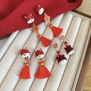Chinese New Year Year of the Ox red tassel earrings with gold Fu character details