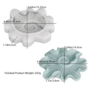 Detailed macro view of spiral petal tray silicone mold with dimensions and blue resin cast