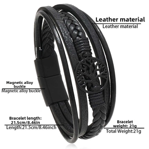 Detail view of multilayer leather bracelet with tree of life charm and magnetic buckle
