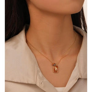 French retro gold necklace with rectangle horse pendant and colorful enamel floral accents