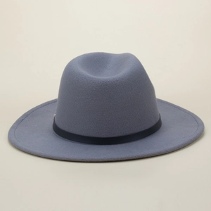 Detail of grey wool fedora hat featuring a stylish black decorative band and wide brim