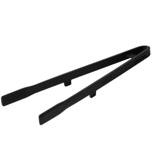 Black heat-resistant silicone kitchen tongs for cooking steak and bread on white background
