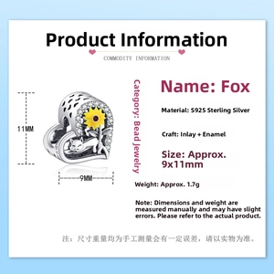 Macro detail of S925 sterling silver fox charm with yellow enamel and size dimensions