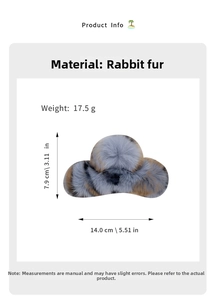 Detail view showing large rabbit fur hair claw clip in gray blue cloud shape design