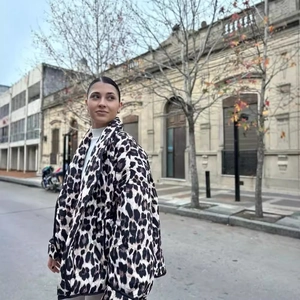 Women's leopard print quilted puffer jacket with a stand collar and loose fit style