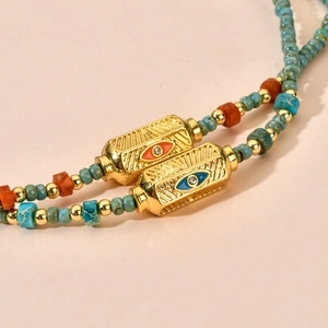 Vintage turquoise beaded necklace with gold plated evil eye pendant for women