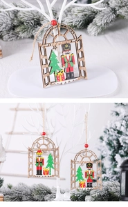 Detail of wooden nutcracker window ornament hanging on a white Christmas tree