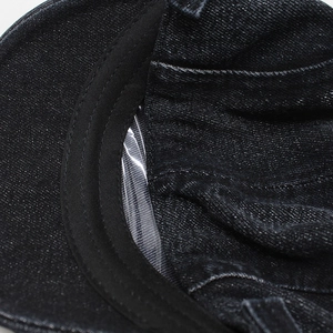 Detailed close-up of the washed black denim baseball cap with sturdy inner sweatband