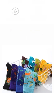 Detailed view of colorful animal pattern cotton crew socks featuring giraffe and tiger motifs