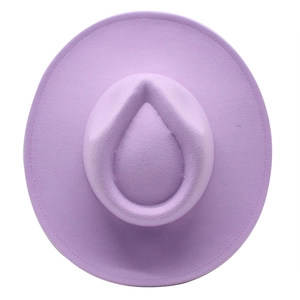 Top view of a minimalist lavender wool fedora hat with teardrop crown on white background