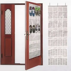 Detail of 24 clear PVC pockets on over-the-door shoe organizer with three metal hooks