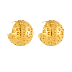 Macro shot of 18k gold earrings with unique hollow ball design and lunar surface texture
