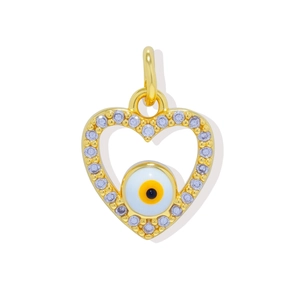 Detail of 18K gold plated heart charm with cubic zirconia edges and evil eye inlay