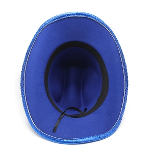 Detail of blue cowboy hat interior showing black sweatband and glittery silver edge trim