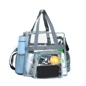 Detailed view of grey trim transparent travel bag with side mesh pockets and front pouch