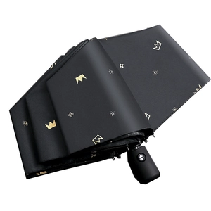 Automatic foldable black umbrella with golden crown prints and UV protection coating
