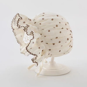 Chapeau de soleil en coton pour bébé beige à pois marron avec bord à volants