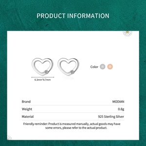 MODIAN 925 sterling silver hollow heart stud earrings with cubic zirconia, size 6.3x8.7mm