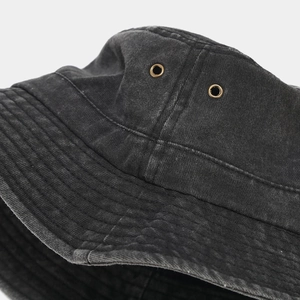 Dark grey washed cotton bucket hat with vintage finish and metal ventilation eyelets