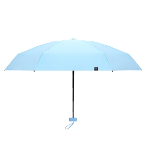 Sky blue flat six-fold umbrella with black UV coating and matching carry handle