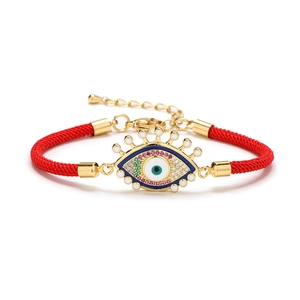 Bracelet ajustable en corde rouge avec pendentif œil maléfique en cristal et fermoir homard