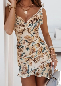 Detailed close-up of ruffle sleeves and floral pattern on a summer V-neck dress