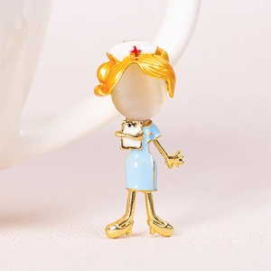 Detailed close-up of a cartoon nurse brooch with blue enamel uniform and golden metal edges