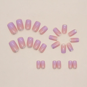 Purple and pink gradient press-on nails with silver glitter in medium square shape