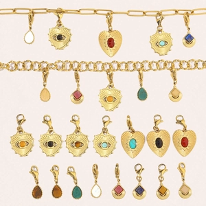 Variety of gold stainless steel heart and evil eye pendants with colorful natural stones